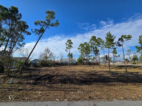 Photo of 429 7th St, Mexico Beach, FL 32456 (MLS # 325191)