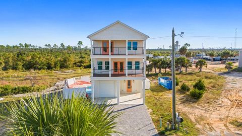 Photo of 108 N 32nd St, Mexico Beach, FL 32456 (MLS # 324454)