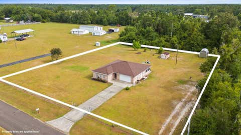 Photo of 158 Our Town Rd, Wewahitchka, FL 32465 (MLS # 328730)