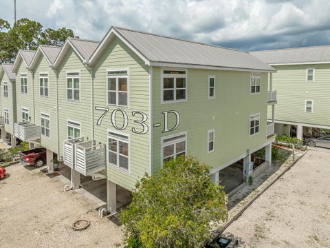 Photo of 703 SE 3rd St #703-D, Carrabelle, FL 32322 (MLS # 329248)
