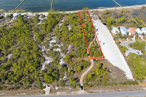 Photo of 1613 E Gulf Beach Dr, Saint George Island, FL 32328 (MLS # 326418)