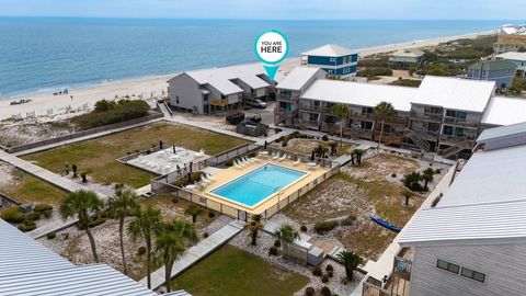 Photo of 1760 E Gulf Beach Dr, Saint George Island, FL 32328 (MLS # 328021)