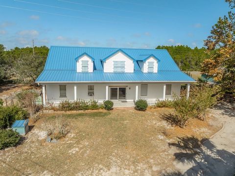 Photo of 34 Hammock Cove Rd, Eastpoint, FL 32328 (MLS # 320061)