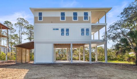 Photo of 122 Sea Mist Dr, Port Saint Joe, FL 32456 (MLS # 322648)