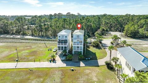 Photo of 110 Anglers Harbor Ln, Carrabelle, FL 32322 (MLS # 324985)