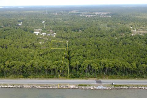 Photo of 310 Gramercy Plantation Blvd, Eastpoint, FL 32328 (MLS # 328272)