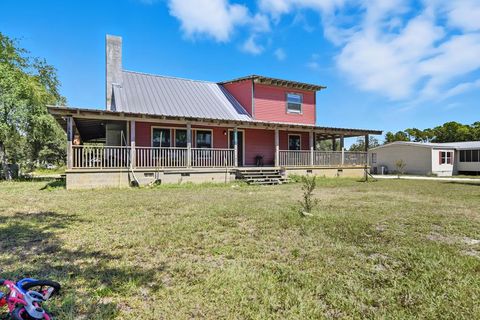 Photo of 1097 Cypress St, Apalachicola, FL 32320 (MLS # 328213)