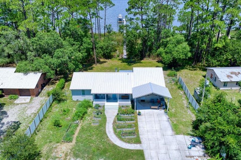 Photo of 191 N Bay Shore Dr, Eastpoint, FL 32328 (MLS # 328953)