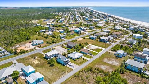 Photo of 126 Pine St, Mexico Beach, FL 32456 (MLS # 327950)