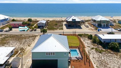 Photo of 725 E Gorrie Dr, Saint George Island, FL 32328 (MLS # 321725)