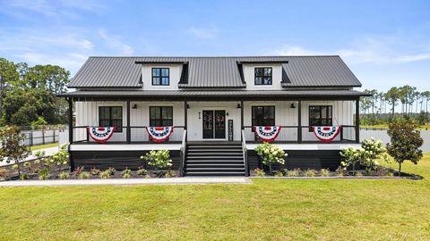 Photo of 619 Jones Homestead Rd, Port Saint Joe, FL 32456 (MLS # 328935)