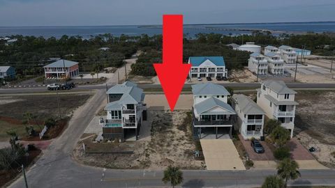 Photo of 251 W Gorrie Dr, Saint George Island, FL 32328 (MLS # 328087)
