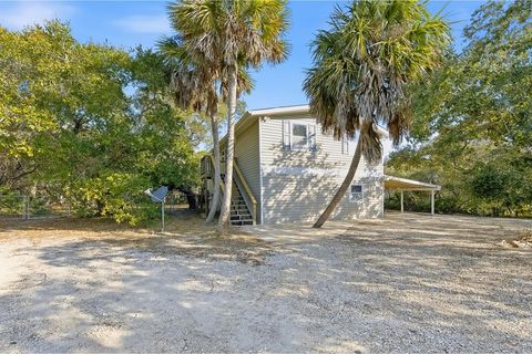 Photo of 909 W Gulf Beach Dr, Saint George Island, FL 32328 (MLS # 326424)