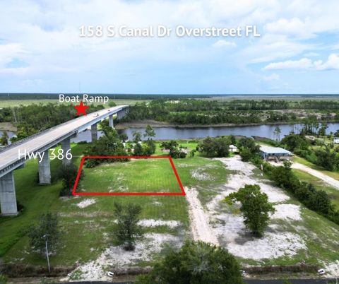 Photo of 158 S Canal Dr #2-BR, Overstreet, FL 32456 (MLS # 321583)