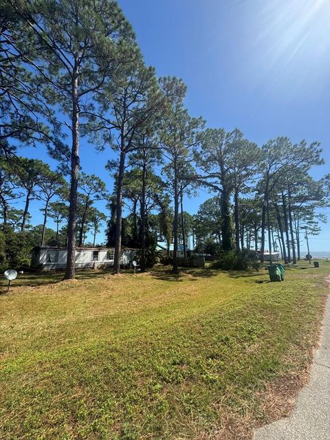 Photo of 14 6th St, Eastpoint, FL 32328 (MLS # 324274)