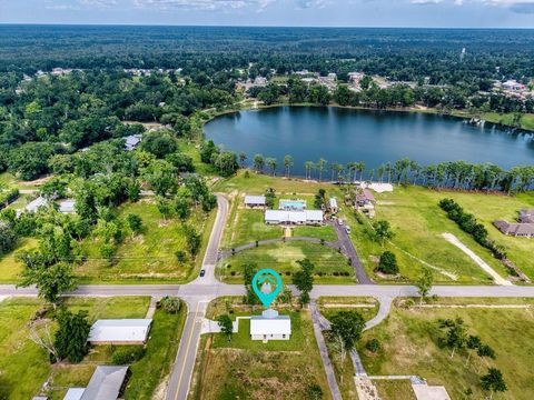 Photo of 250 Winnie St, Wewahitchka, FL 32465 (MLS # 323967)