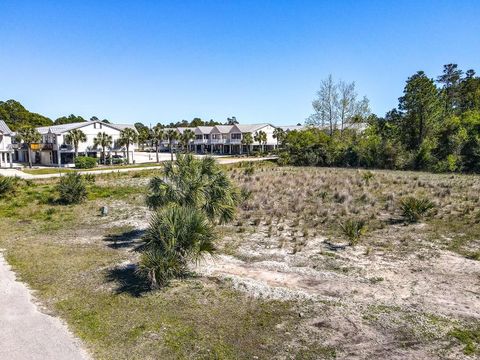 Photo of 418 NE Ave AB, Carrabelle, FL 32322 (MLS # 321807)