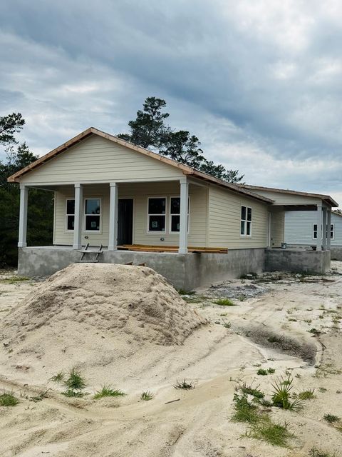 Photo of 1588 Sandpiper Dr, Carrabelle, FL 32322 (MLS # 322748)