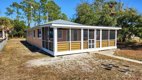 Photo of 1764 Carrabelle Beach Dr, Carrabelle, FL 32322 (MLS # 325078)