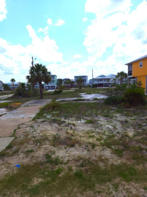 Photo of 111 40th St, Mexico Beach, FL 32456 (MLS # 322420)