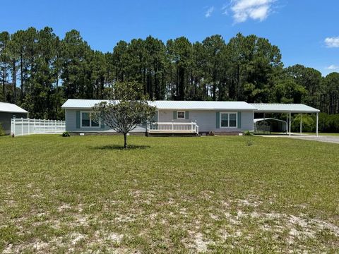 Photo of 203 Old Ferry Dock Rd, Eastpoint, FL 32328 (MLS # 327680)