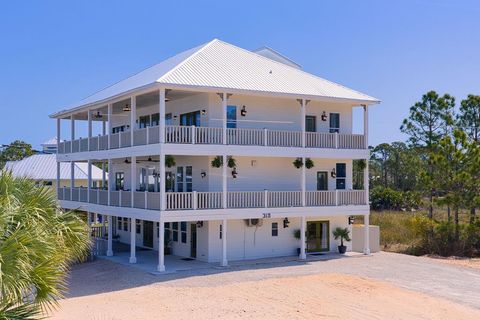 Photo of 315 Quinn St, Saint George Island, FL 32328 (MLS # 328176)