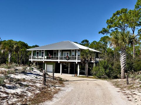 Photo of 1245 E Gulf Beach Dr, Saint George Island, FL 32328 (MLS # 320951)