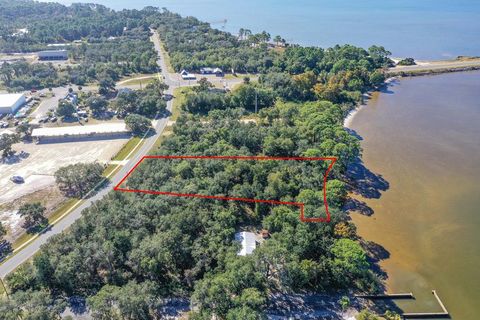 Photo of 29 N Bay Shore Dr, Eastpoint, FL 32328 (MLS # 317753)