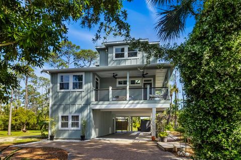 Photo of 825 E Pine Ave, Saint George Island, FL 32328 (MLS # 328132)