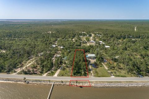 Photo of 841 Hwy 98, Eastpoint, FL 32328 (MLS # 315679)