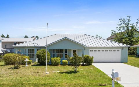Photo of 130 Pine St, Mexico Beach, FL 32456 (MLS # 328242)