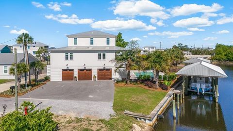 Photo of 209 Water Dr, Mexico Beach, FL 32456 (MLS # 328120)