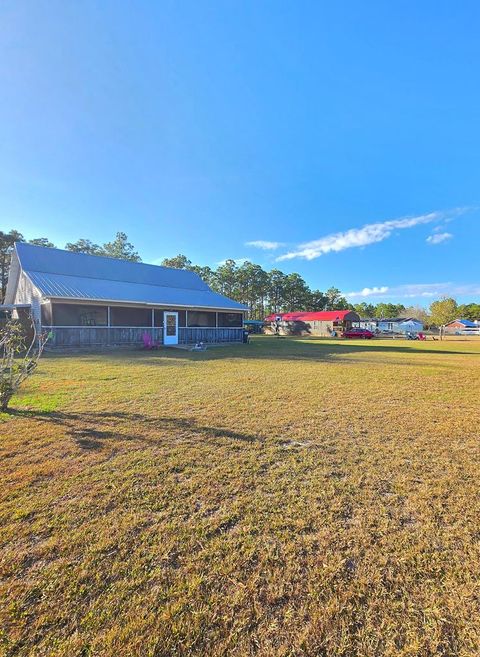 Photo of 306 Huckeba Dr, Apalachicola, FL 32320 (MLS # 327667)