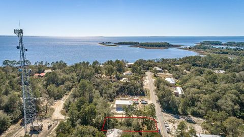 Photo of 510 SE 7th St, Carrabelle, FL 32322 (MLS # 313599)