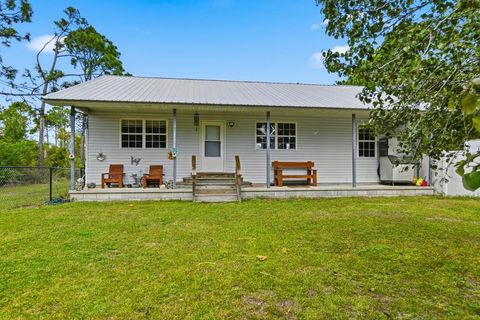 Photo of 673 Wilderness Rd, Eastpoint, FL 32328 (MLS # 324427)