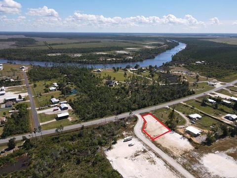 Photo of 105 Yellowfin Dr, Overstreet, FL 32456 (MLS # 324250)