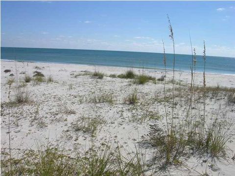 Photo of 1628 E Gulf Beach Dr, Saint George Island, FL 32328 (MLS # 322566)