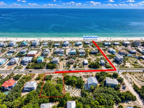 Photo of 1025 E Gulf Beach Dr, Saint George Island, FL 32328 (MLS # 329764)