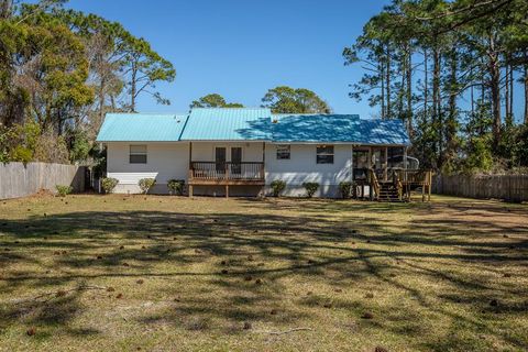 Photo of 10 6th St, Eastpoint, FL 32328 (MLS # 326570)