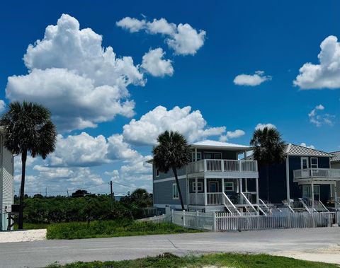 Photo of 828 Oleander Ave, Mexico Beach, FL 32456 (MLS # 325020)