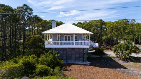 Photo of 1465 E Gulf Beach Dr, Saint George Island, FL 32328 (MLS # 328137)