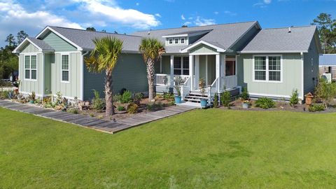 Photo of 278 Wetappo Dr, Wewahitchka, FL 32465 (MLS # 328414)