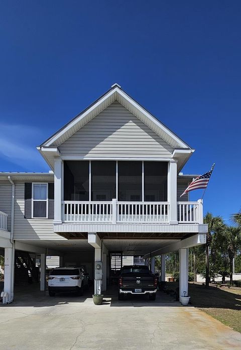 Photo of 512 E Meridian Ave #C, Carrabelle, FL 32322 (MLS # 327879)