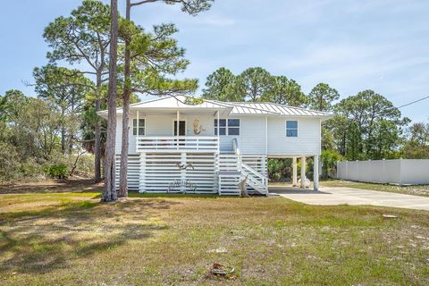 Photo of 980 W Bay Shore Dr, Saint George Island, FL 32328 (MLS # 327945)