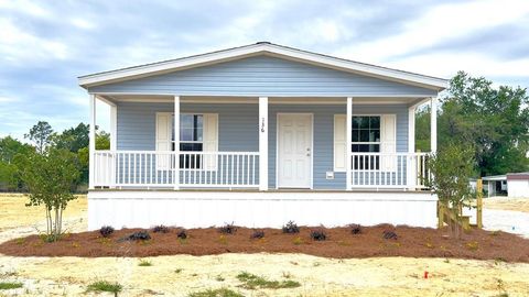 Photo of 136 Meadow Ln, Wewahitchka, FL 32465 (MLS # 324395)
