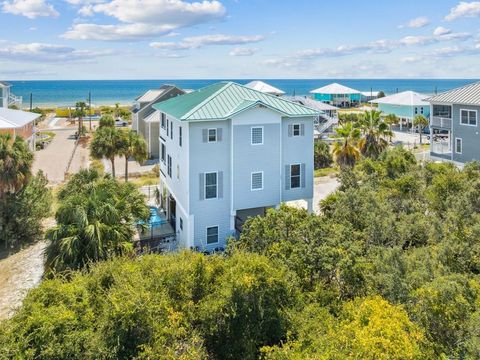 Photo of 1032 E Gulf Beach Dr, Saint George Island, FL 32328 (MLS # 324134)