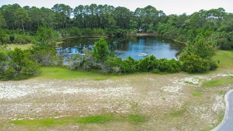 Photo of 183 Lakes on the Bluff Dr, Eastpoint, FL 32328 (MLS # 317993)