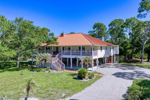 Photo of 332 Cook St, Saint George Island, FL 32328 (MLS # 324589)