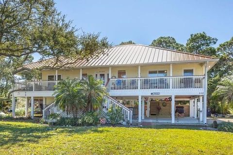 Photo of 332 Cook St, Saint George Island, FL 32328 (MLS # 324589)