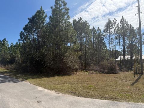 Photo of 916 NE 5th St, Carrabelle, FL 32322 (MLS # 326563)